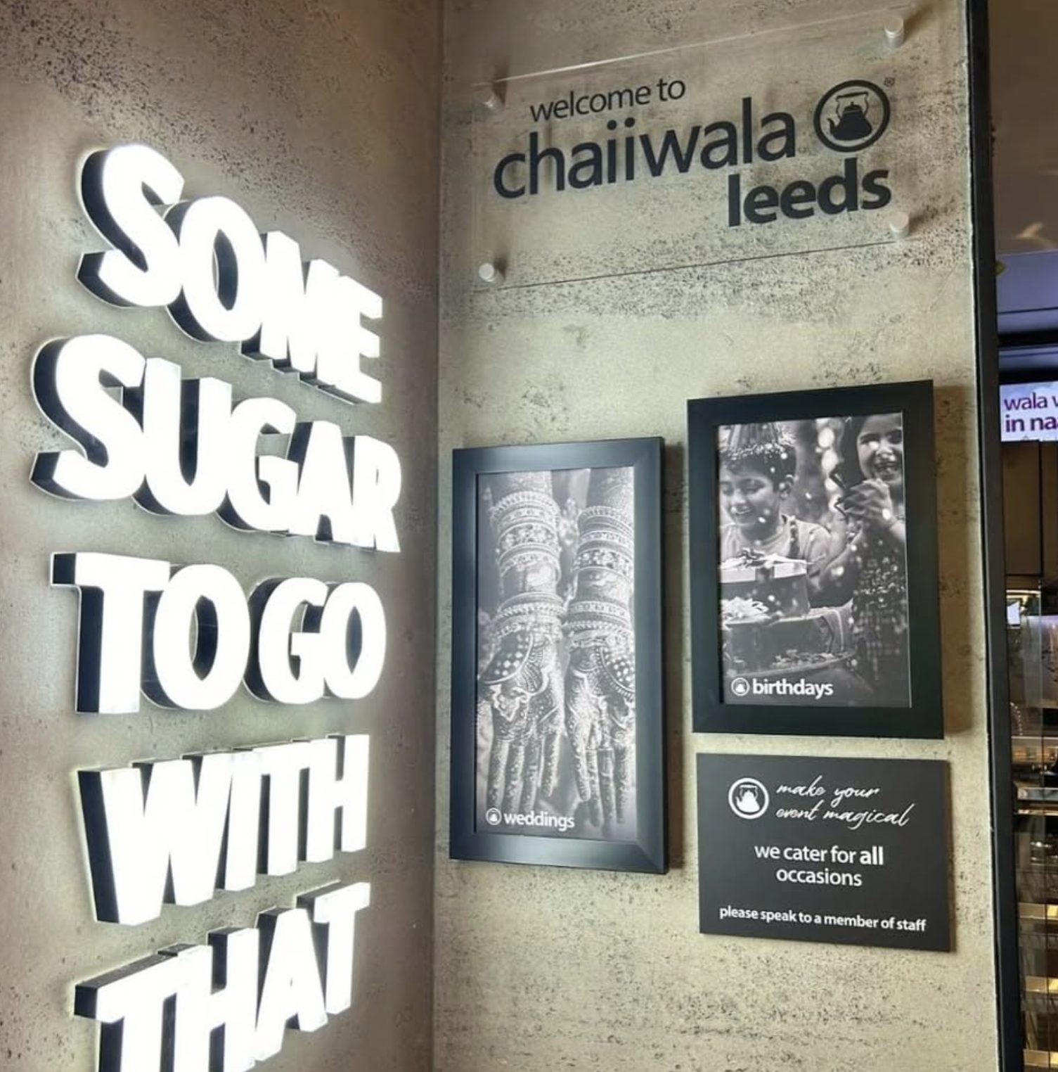 Illuminated “some sugar to go with that” feature signage