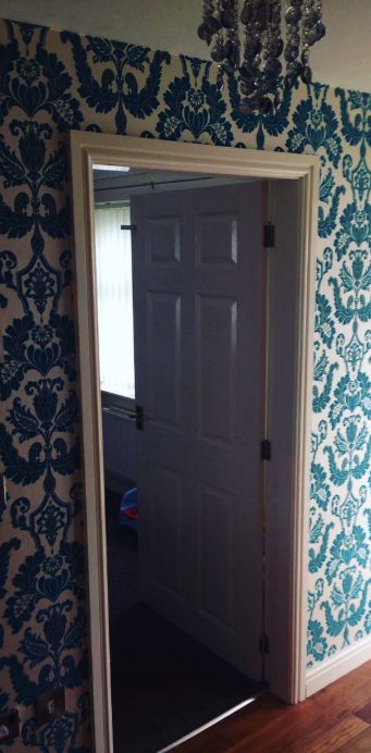 Damask feature wallpapering